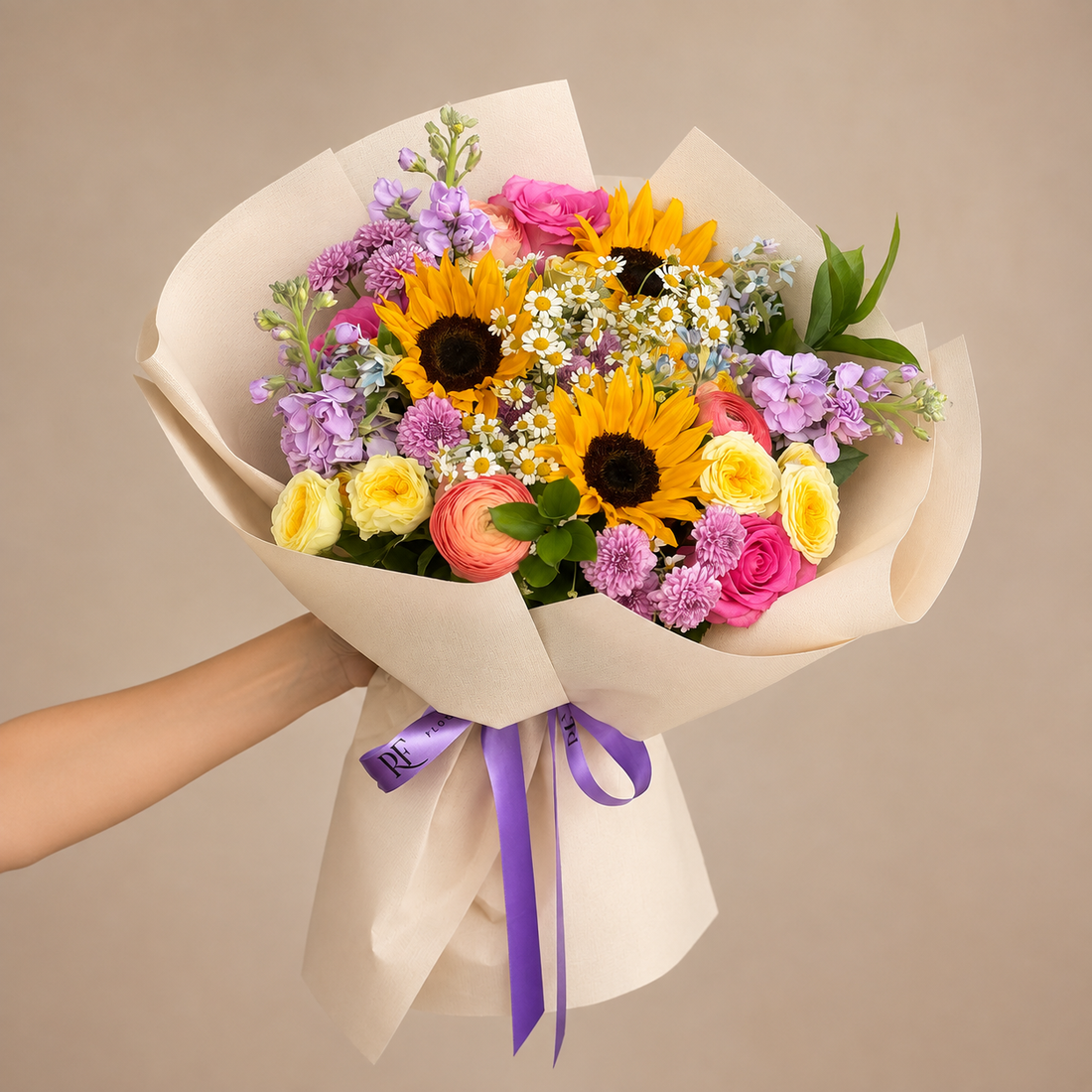 Bright, joyful, and full of color, our Dopamine Bouquet is designed to instantly lift the mood. Featuring cheerful sunflowers, delicate daisies, classic roses, and fragrant stock flowers, this vibrant arrangement brings together playful colors and beautiful textures.

Perfect for birthdays, celebrations, thank-you gifts, congratulations, or simply sending someone a little happiness. Handcrafted with fresh flowers by RF Flowers in Chicago.

Order the Dopamine Bouquet online for same-day flower delivery 